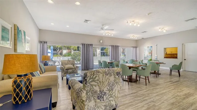 a bed room with furniture and a book shelf
