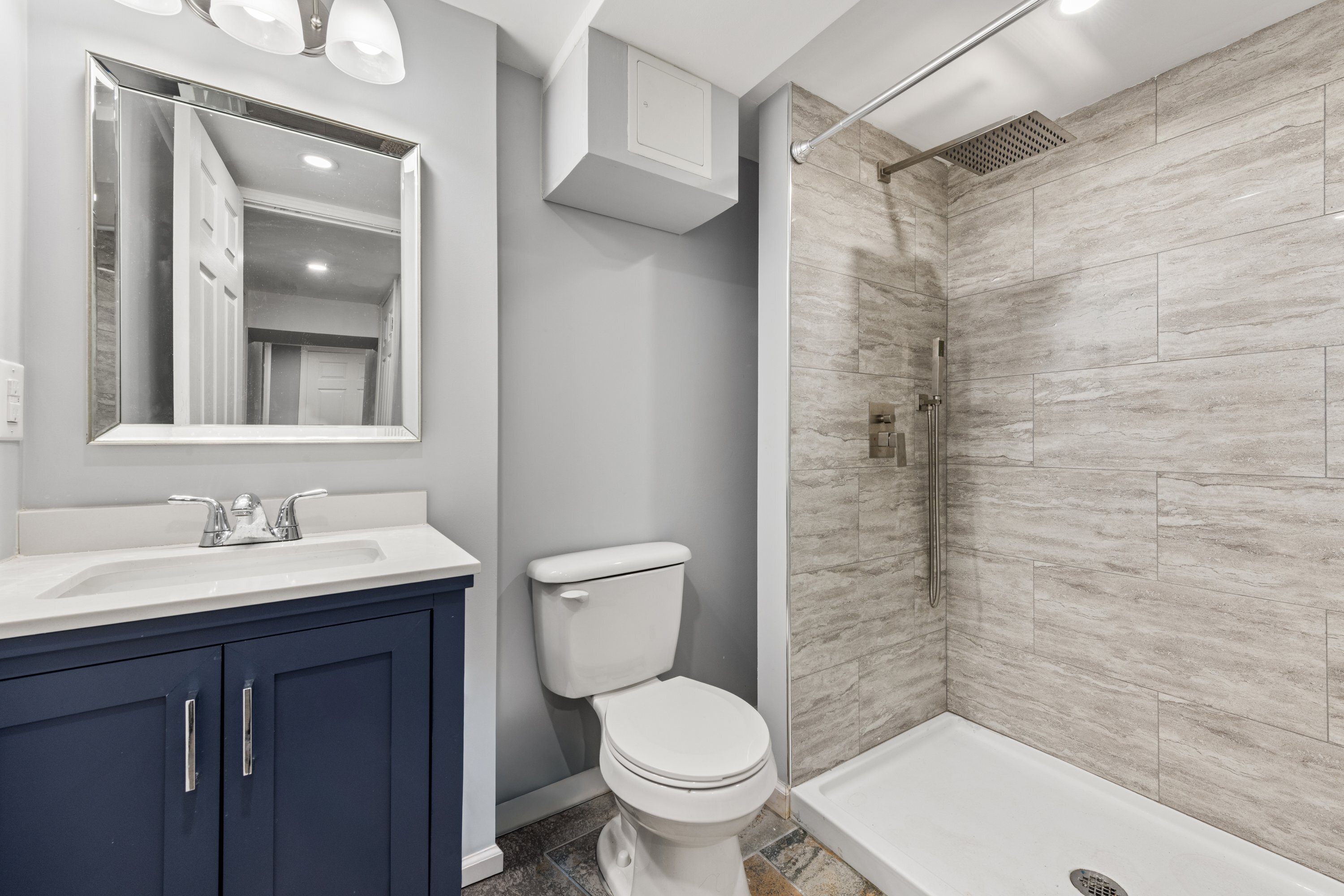 3 Highland Avenue Ansonia, CT 06401 - Photo 31 of 38 a bathroom with a sink a toilet and shower