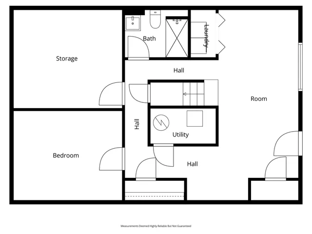 a black and white photo of a bench