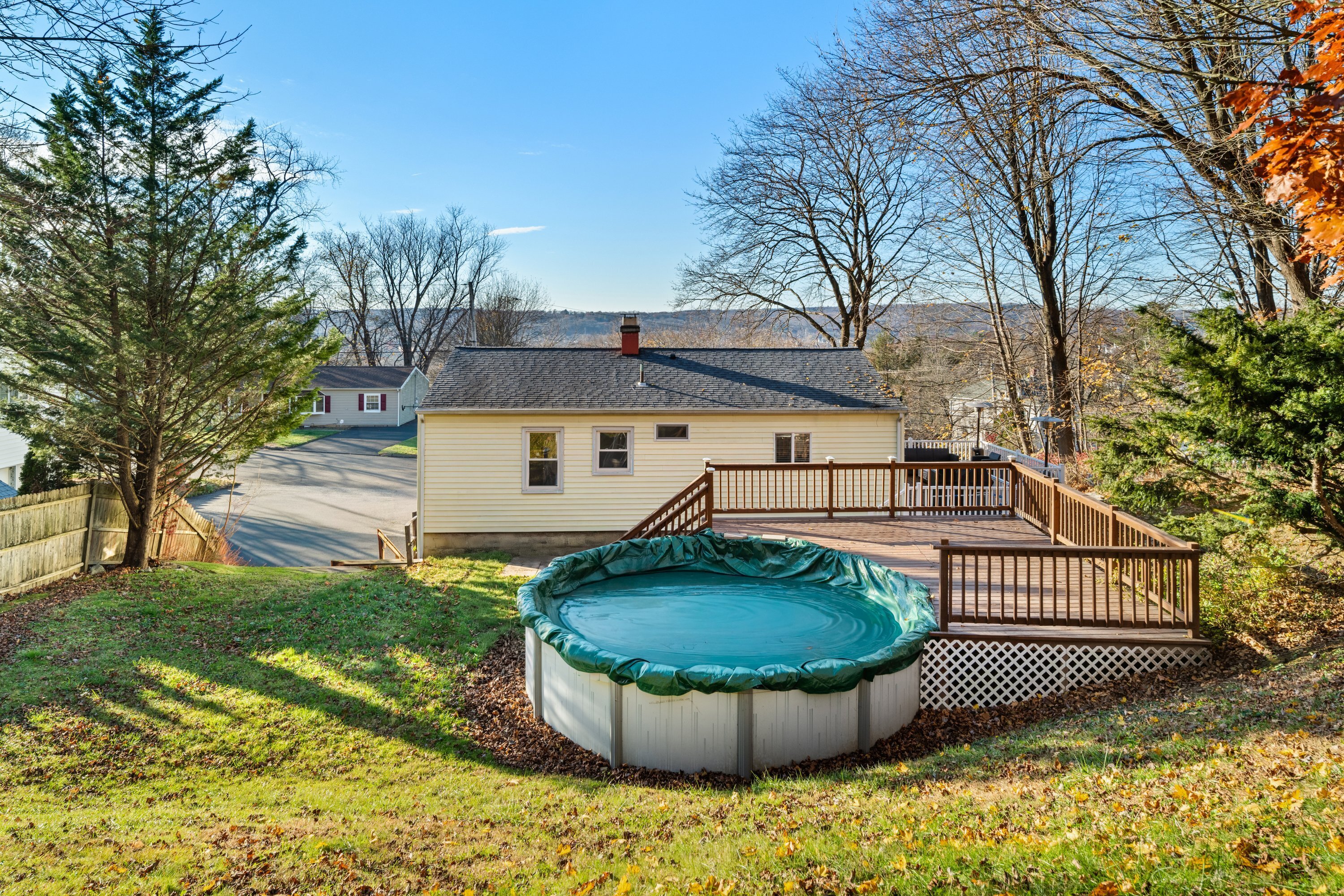 3 Highland Avenue Ansonia, CT 06401 - Photo 9 of 38 a view of a chair and table in the backyard