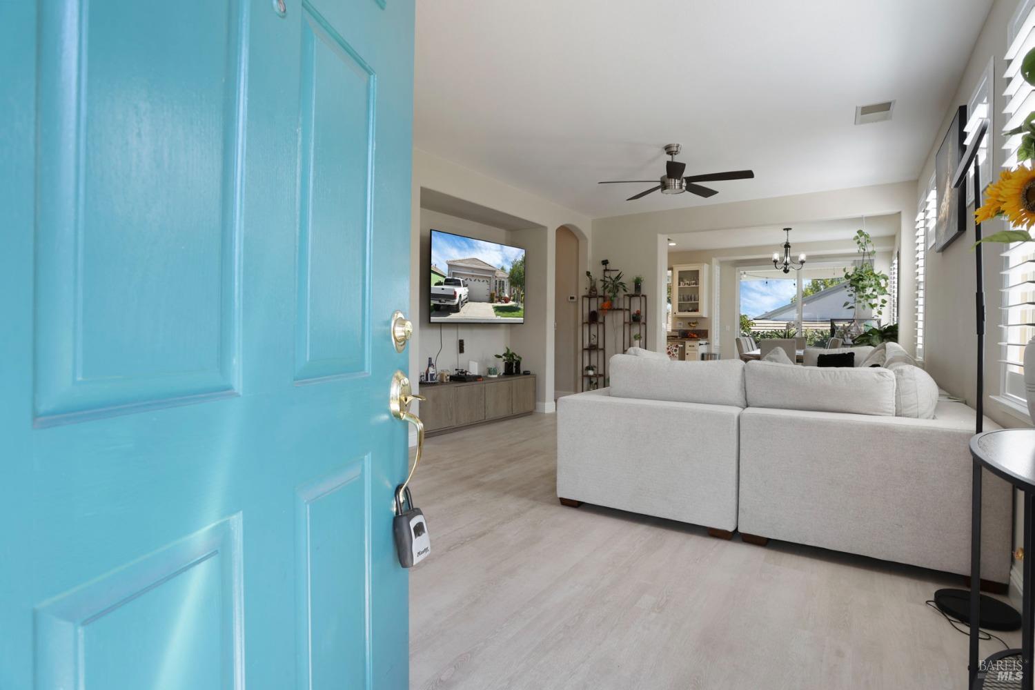 234 Cedar Ridge Drive Rio Vista, CA 94571 - Photo 3 of 33 a living room with furniture a flat screen tv and a window