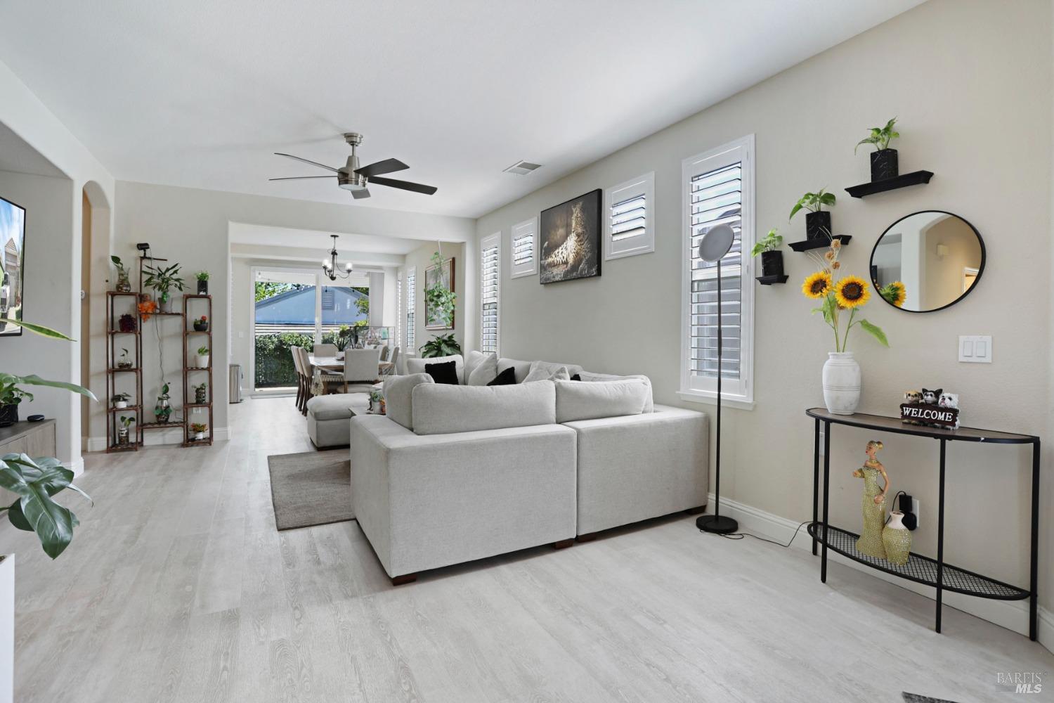 234 Cedar Ridge Drive Rio Vista, CA 94571 - Photo 5 of 33 a living room with furniture a chandelier fan and a window