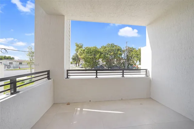 a house view with a garden space