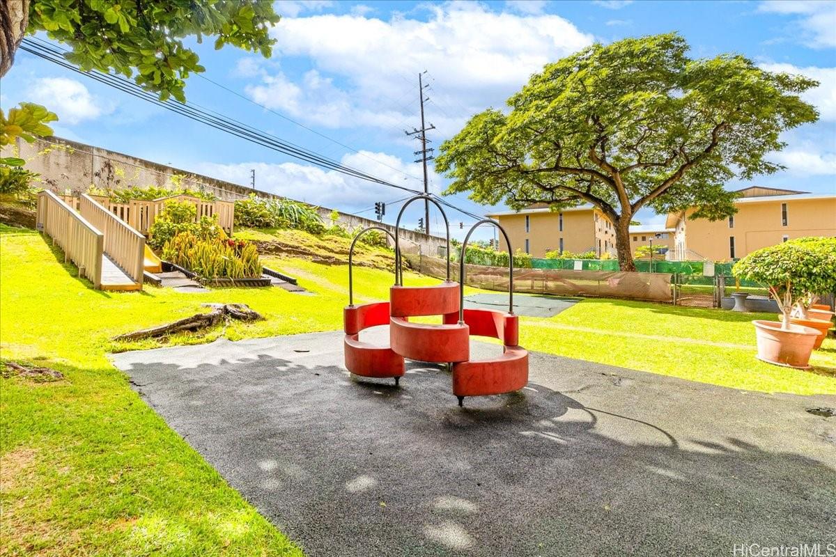 3215 Ala Ilima Street, Unit A/PH2 Honolulu, HI 96818 - Photo 19 of 25 a view of backyard with swimming pool