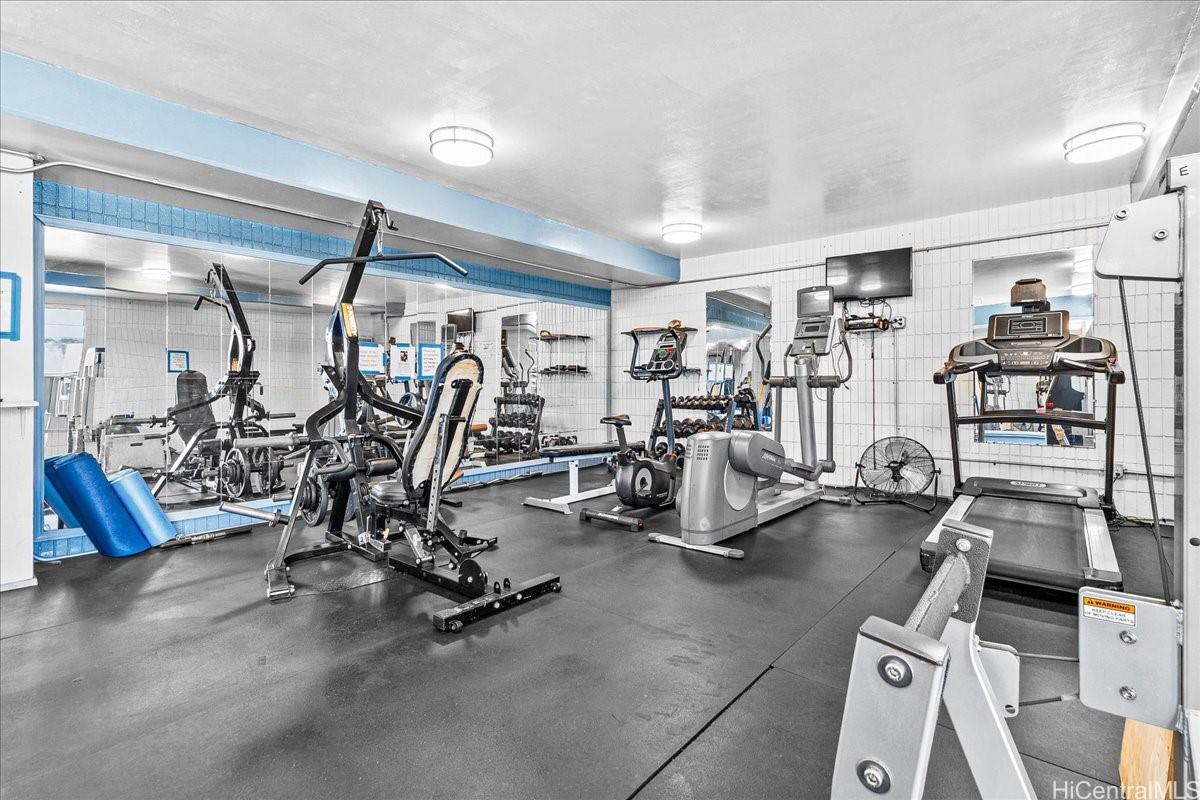 3215 Ala Ilima Street, Unit A/PH2 Honolulu, HI 96818 - Photo 20 of 25 a view of a room with gym equipment