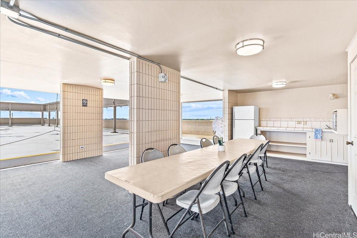 3215 Ala Ilima Street, Unit A/PH2 Honolulu, HI 96818 - Photo 22 of 25 a view of a dining room with furniture
