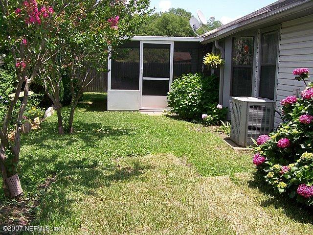 8433 Winter Berry Road Jacksonville, FL 32210 - Photo 14 of 14 Patio and Backyard