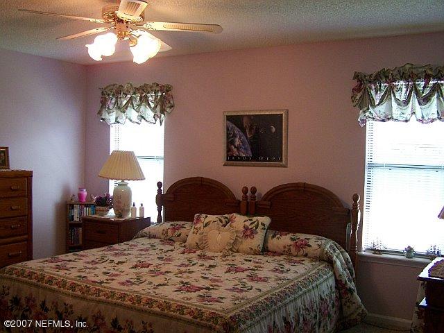 8433 Winter Berry Road Jacksonville, FL 32210 - Photo 9 of 14 Master Bedroom