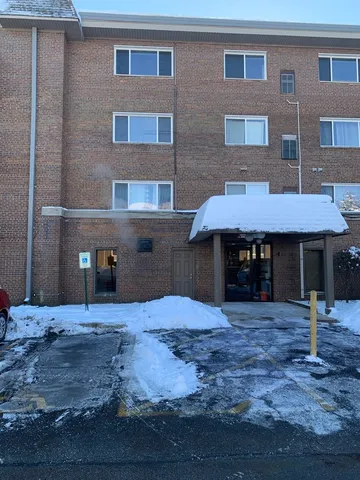 a front view of a house with yard