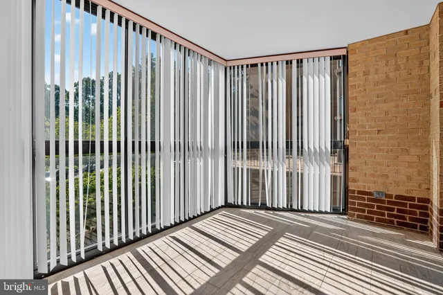 a view of a balcony with a park