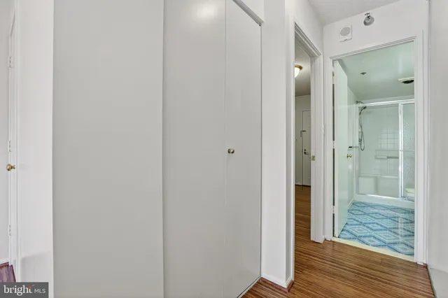 a view of a bathroom with a shower and a sink