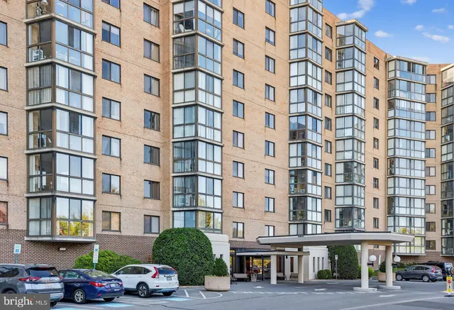 a front view of a building with a street