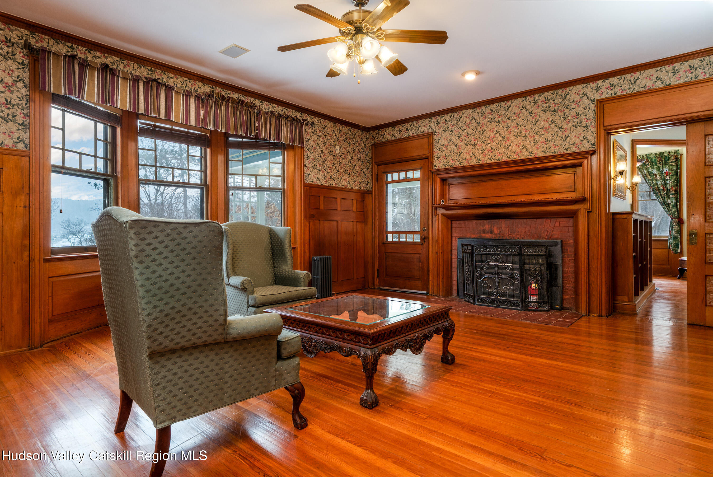 6 Westridge Road Cooperstown, NY 13326 - Photo 16 of 109 a living room with furniture and a fireplace