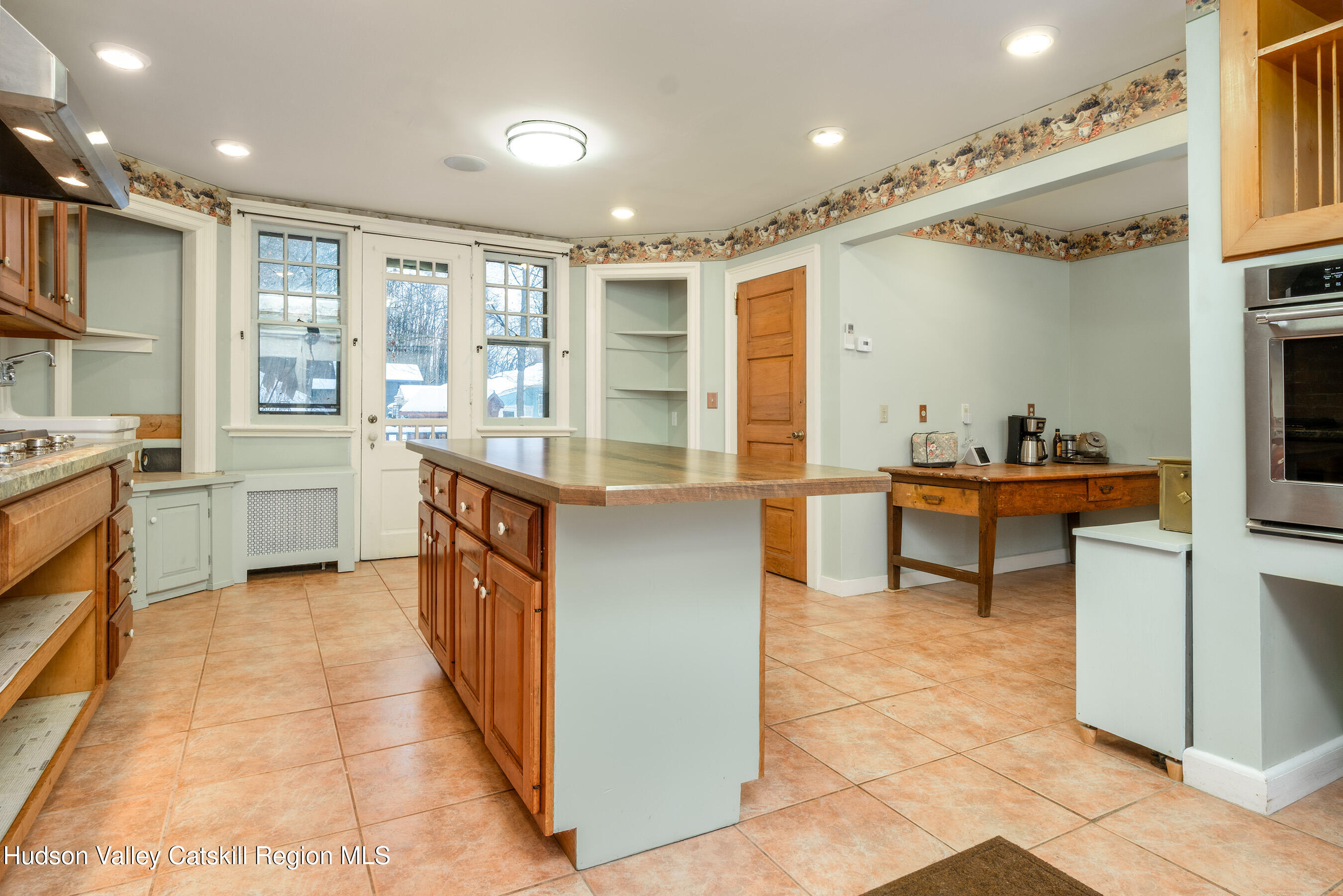 6 Westridge Road Cooperstown, NY 13326 - Photo 31 of 109 a kitchen with stainless steel appliances granite countertop a sink and cabinets