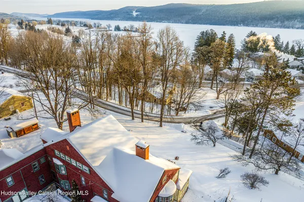 a view of a livingroom with furniture and window