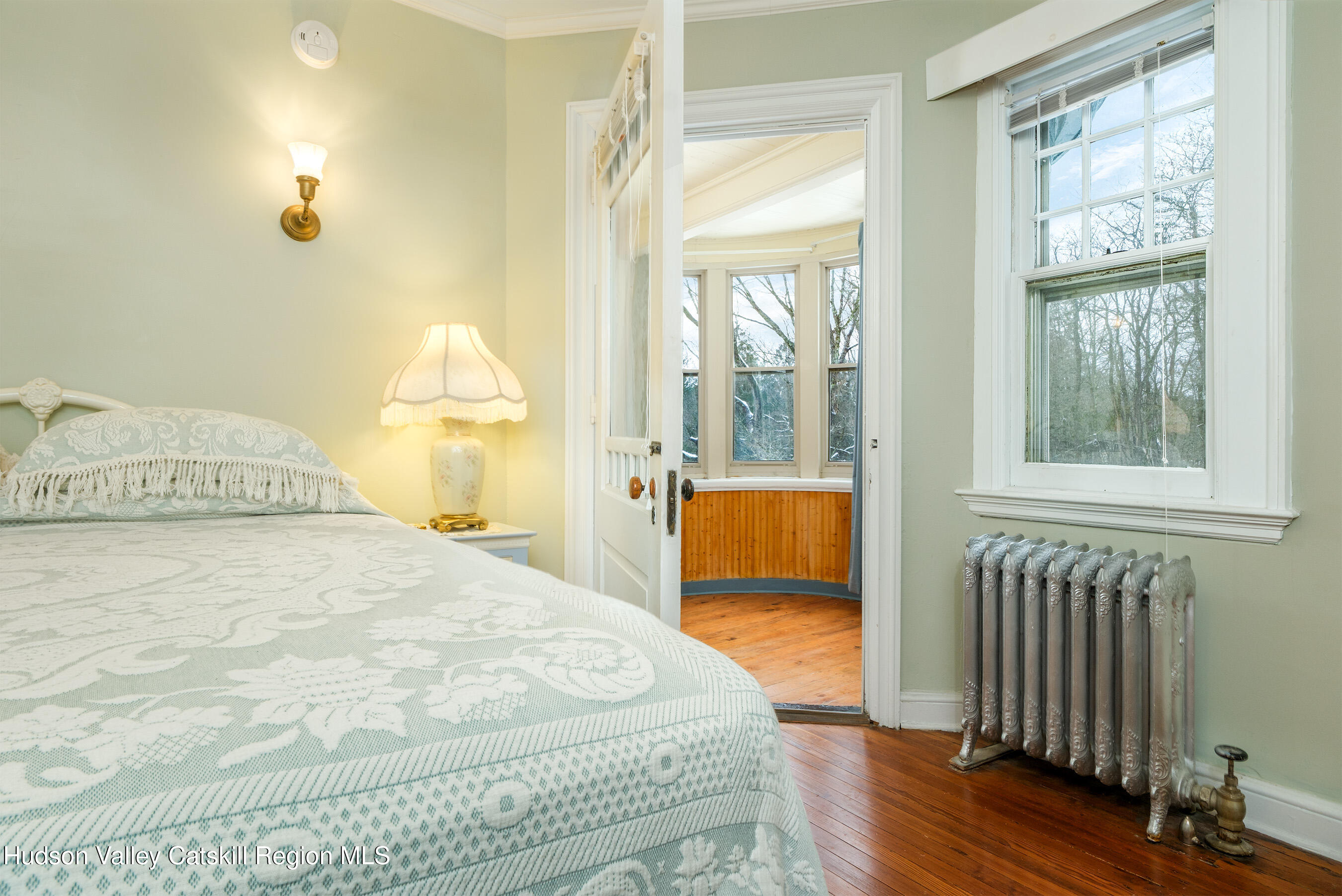 6 Westridge Road Cooperstown, NY 13326 - Photo 51 of 109 a bedroom with a bed and wooden floor