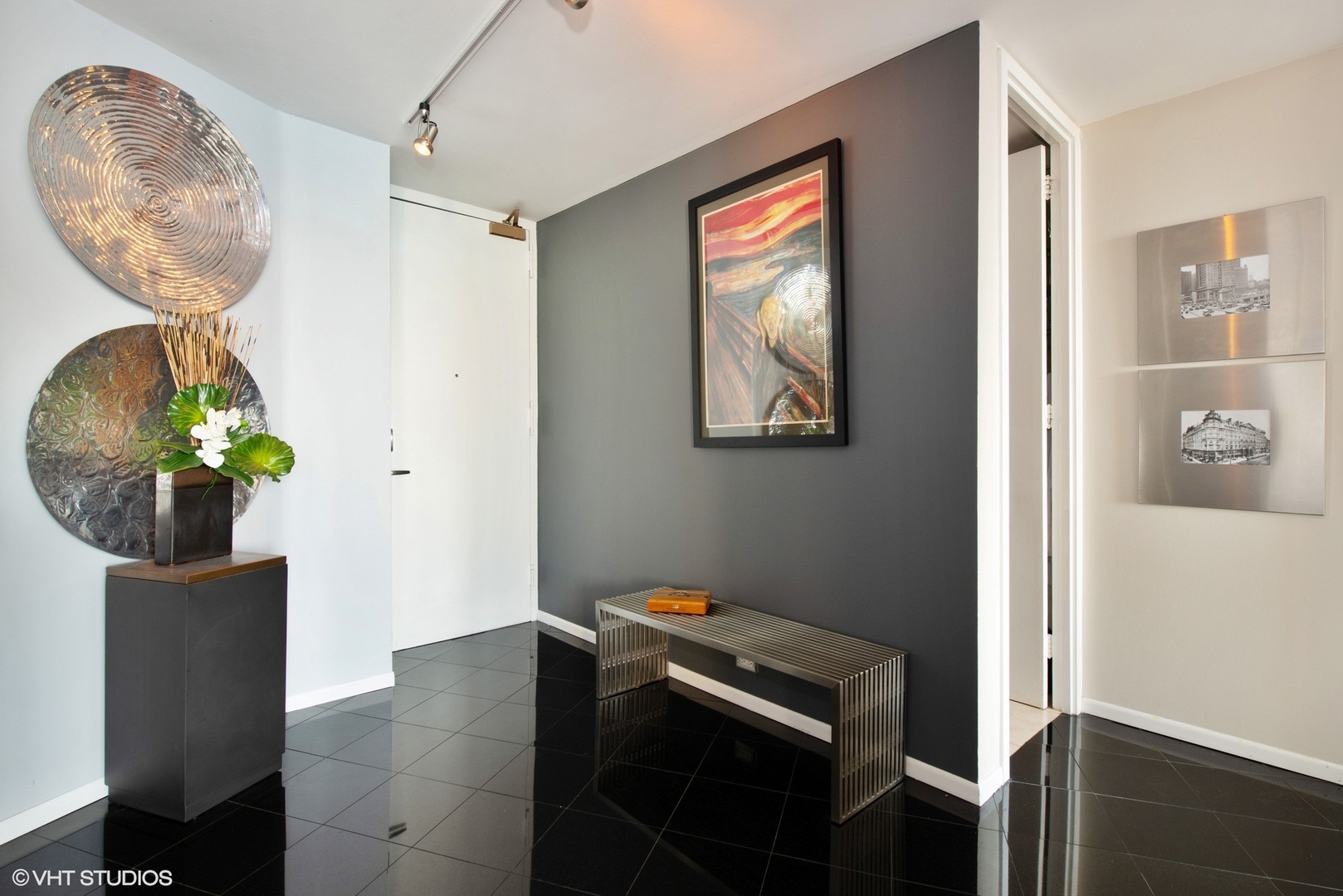 505 North Lake Shore Drive, Unit 1518 Chicago, IL 60611 - Photo 12 of 28 a room with painting and a table