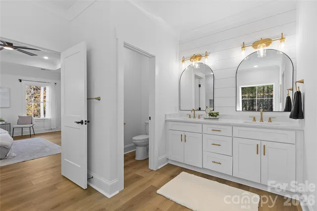 a kitchen with a cabinets and a wooden floor