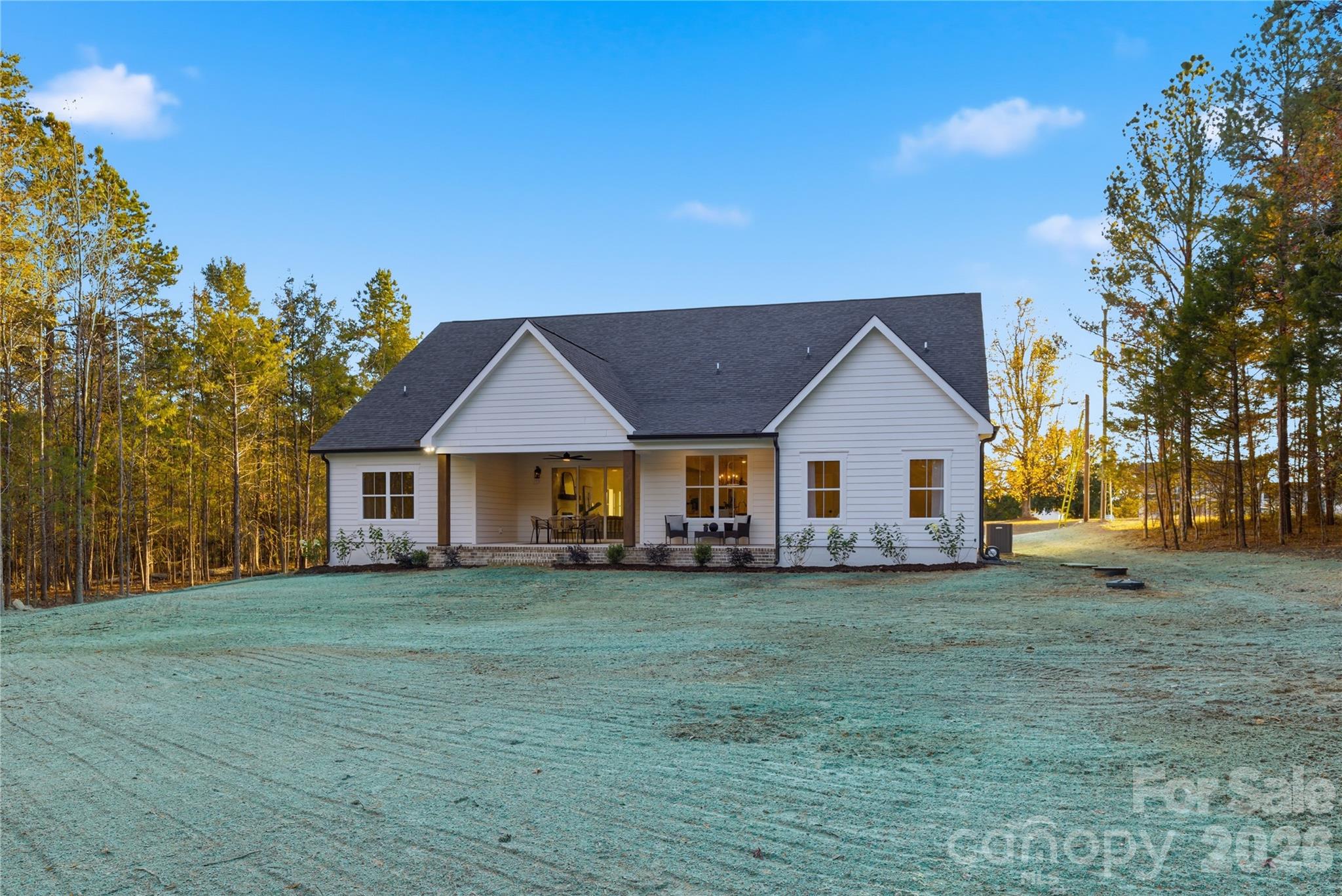 9729 Flowes Store Road Midland, NC 28107 - Photo 29 of 29 a front view of a house with a yard