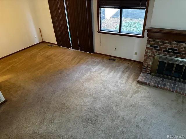 an empty room with windows