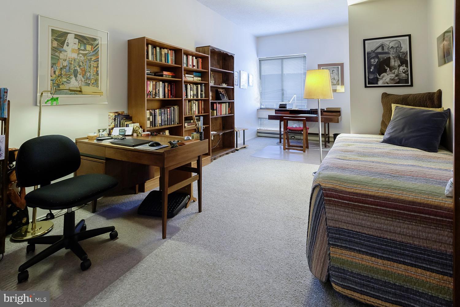 1 Markham Road, Unit 2B Princeton, NJ 08540 - Photo 16 of 19 a living room with furniture and a piano next to a window
