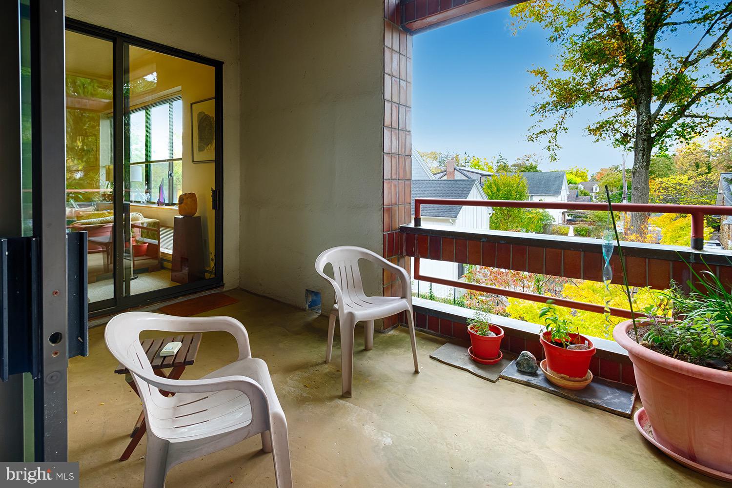 1 Markham Road, Unit 2B Princeton, NJ 08540 - Photo 5 of 19 a outdoor living space with furniture and a garden