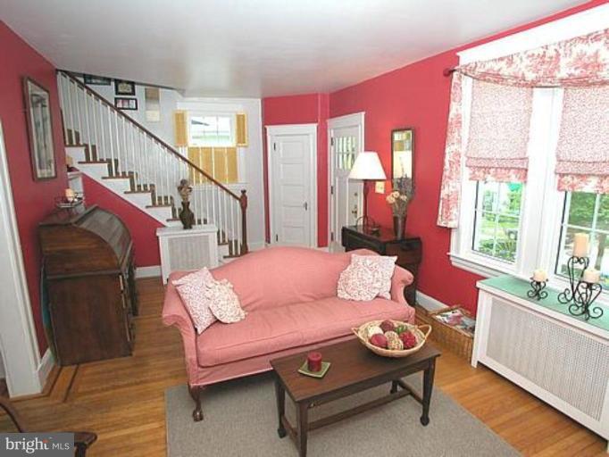 1100 Overbrook Road Baltimore, MD 21239 - Photo 2 of 23 a living room with furniture and a large window