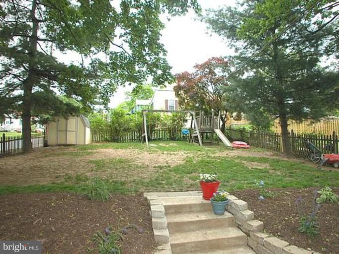 1100 Overbrook Road Baltimore, MD 21239 - Photo 21 of 23 a view of a park with large trees