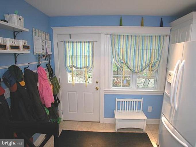 1100 Overbrook Road Baltimore, MD 21239 - Photo 23 of 23 a living room with furniture and a window