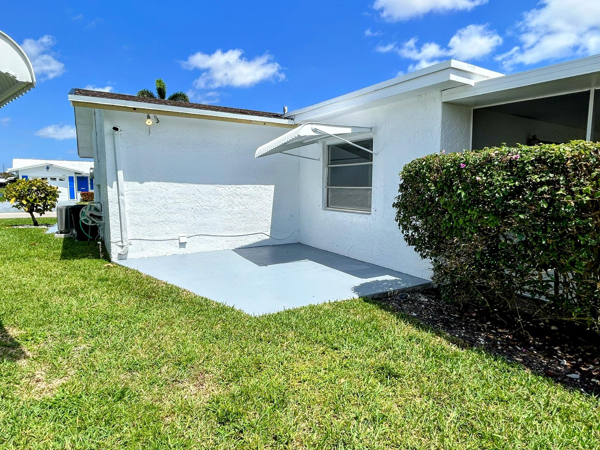 1900 Southwest Roma Way Boynton Beach, FL 33426 - Photo 31 of 33 SIDE PATIO