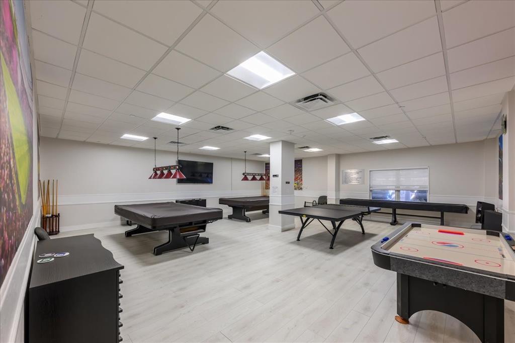 405 North Ocean Boulevard, Unit 611 Pompano Beach, FL 33062 - Photo 17 of 39 a view of a room with gym equipment