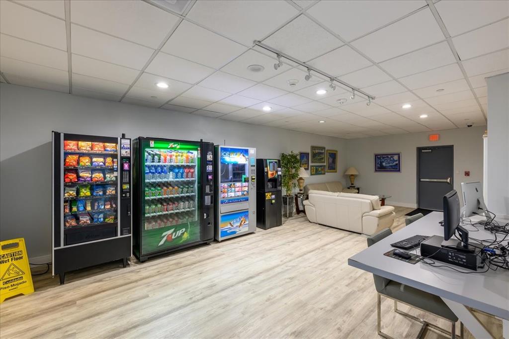 405 North Ocean Boulevard, Unit 611 Pompano Beach, FL 33062 - Photo 18 of 39 a living room with furniture a wooden floor and next to a window