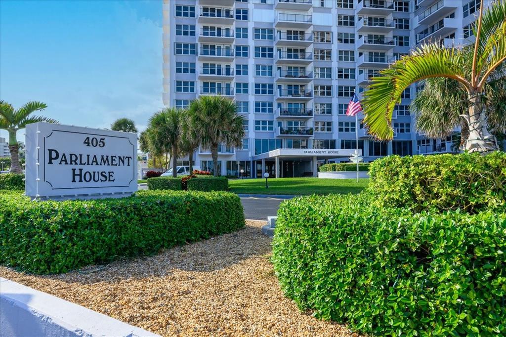 405 North Ocean Boulevard, Unit 611 Pompano Beach, FL 33062 - Photo 20 of 39 a sign on the side of a building