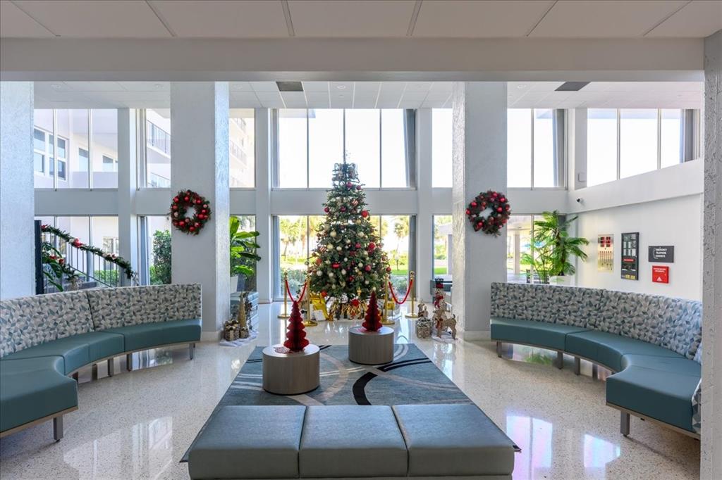 405 North Ocean Boulevard, Unit 611 Pompano Beach, FL 33062 - Photo 22 of 39 a living room with furniture and a potted plant