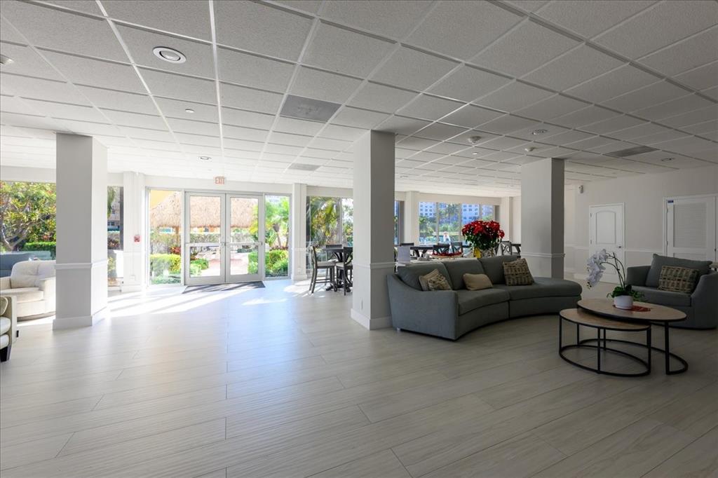 405 North Ocean Boulevard, Unit 611 Pompano Beach, FL 33062 - Photo 25 of 39 a living room with furniture and a large window