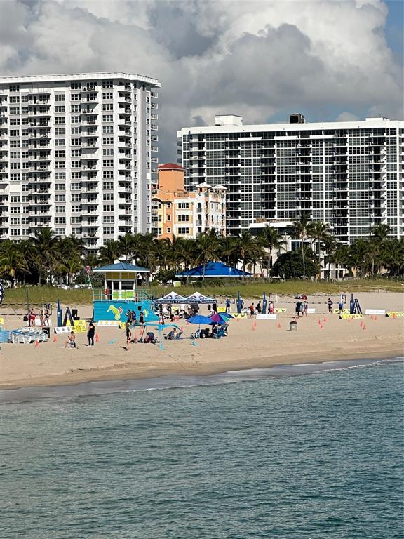 405 North Ocean Boulevard, Unit 611 Pompano Beach, FL 33062 - Photo 3 of 39 a front view of a building with street view