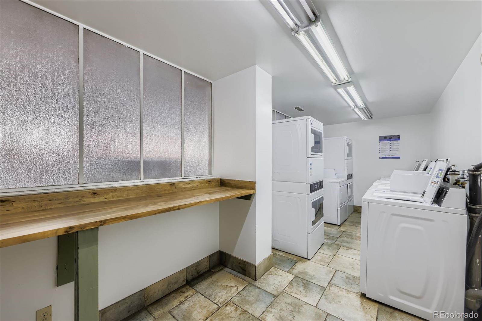 1121 Albion Street, Unit 709 Denver, CO 80220 - Photo 18 of 24 a view of bathroom with a sink and mirror