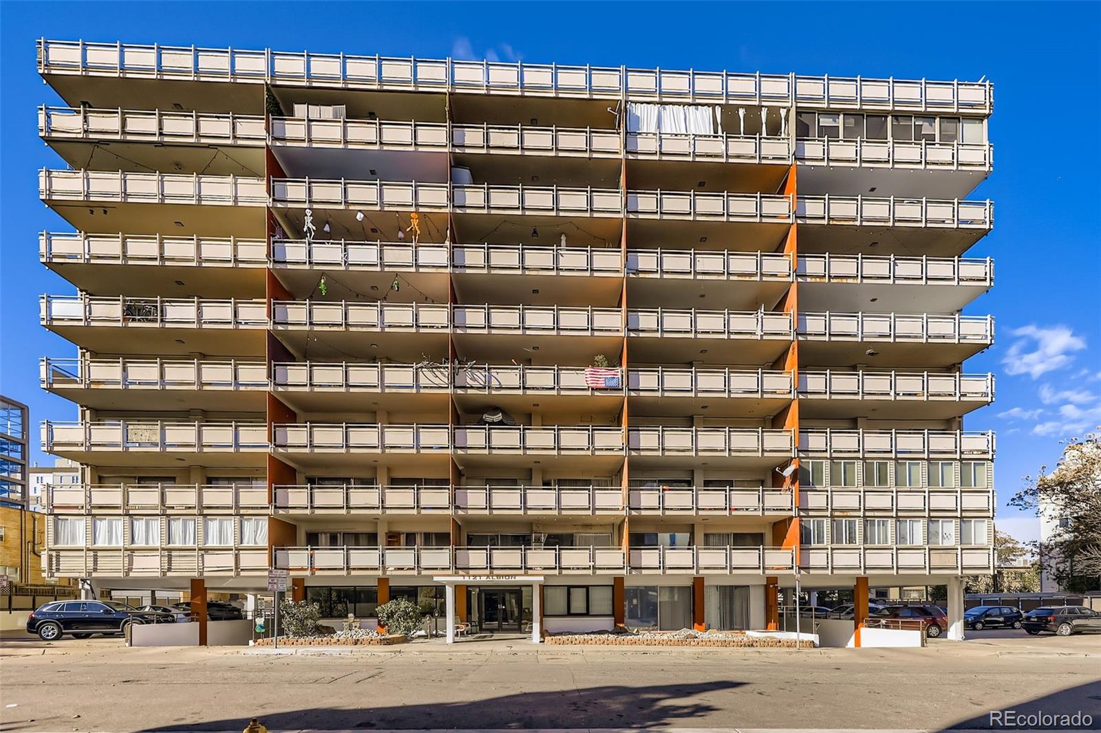 1121 Albion Street, Unit 709 Denver, CO 80220 - Photo 19 of 24 a front view of a building with a street