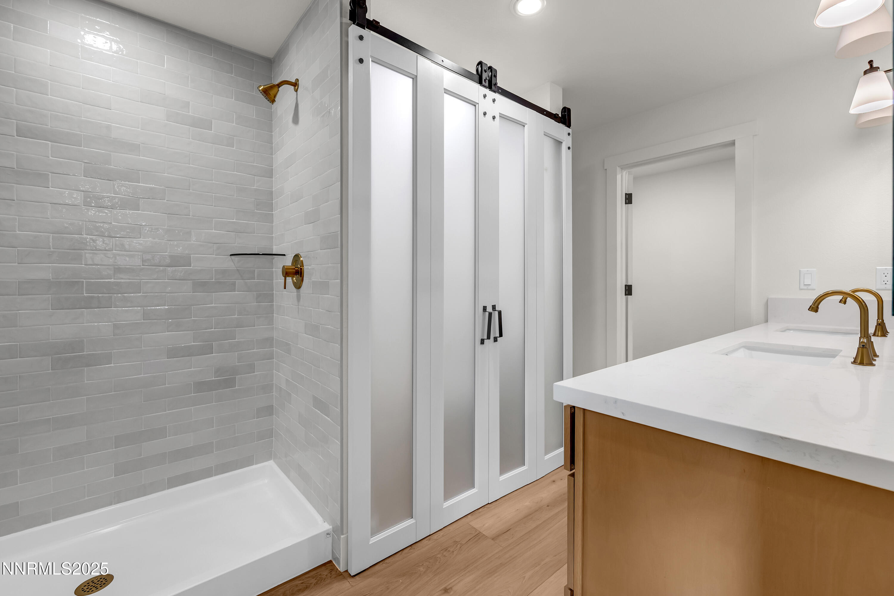 650 John Fremont Drive Reno, NV 89509 - Photo 20 of 37 a bathroom with a shower and a sink