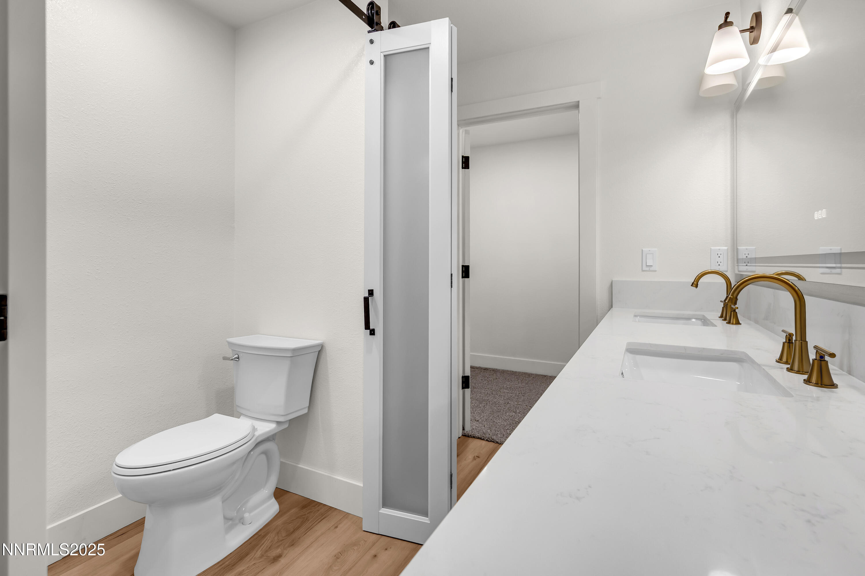 650 John Fremont Drive Reno, NV 89509 - Photo 23 of 37 a bathroom with a toilet sink and shower