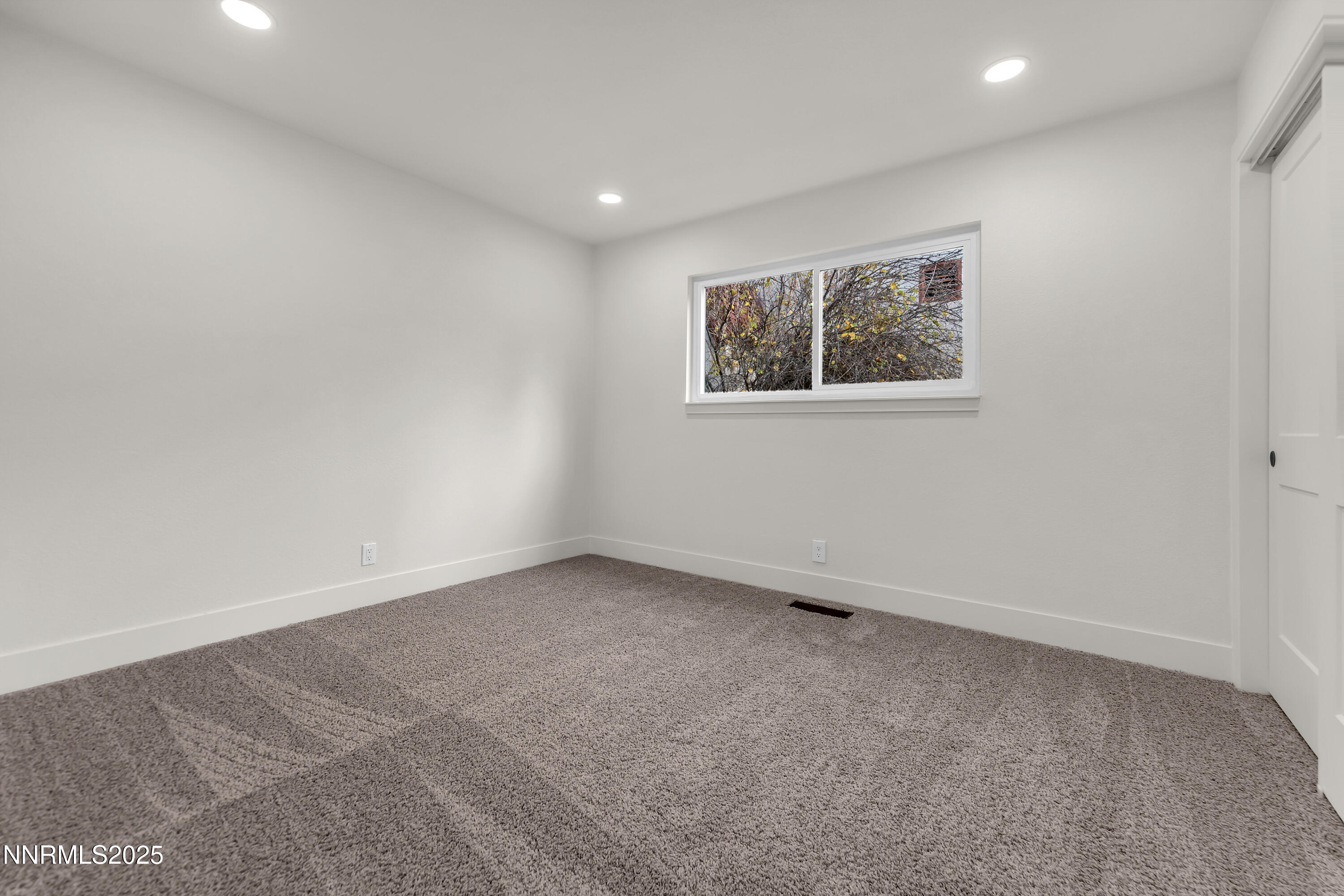 650 John Fremont Drive Reno, NV 89509 - Photo 28 of 37 a view of an empty room with a window