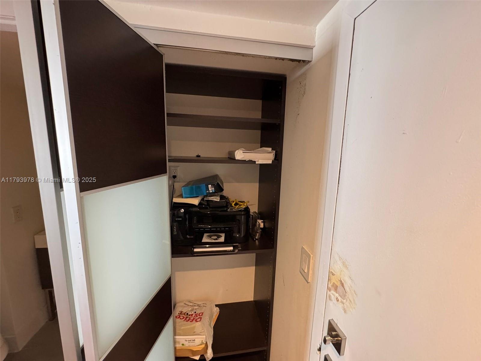 2851 Northeast 183rd Street, Unit 1408E Aventura, FL 33160 - Photo 24 of 24 a view of storage and utility room