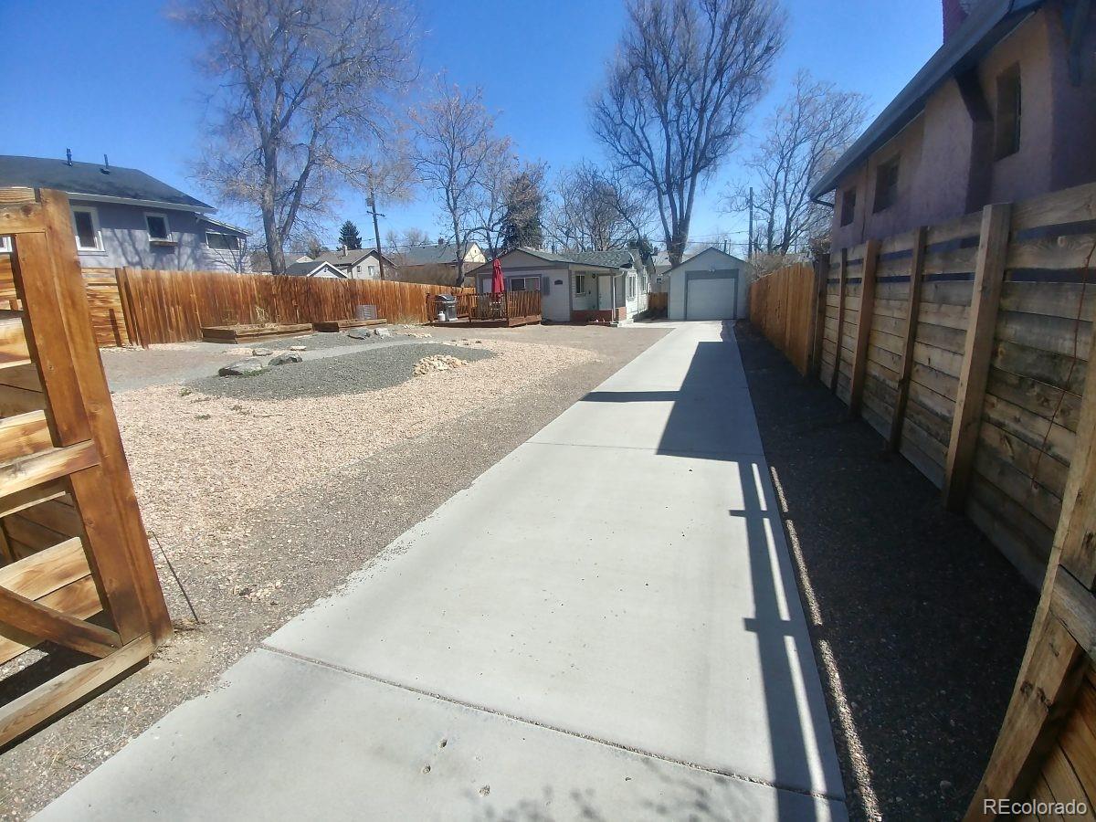 2918 Ames Street Wheat Ridge, CO 80214 - Photo 4 of 19 a view of outdoor space yard and patio