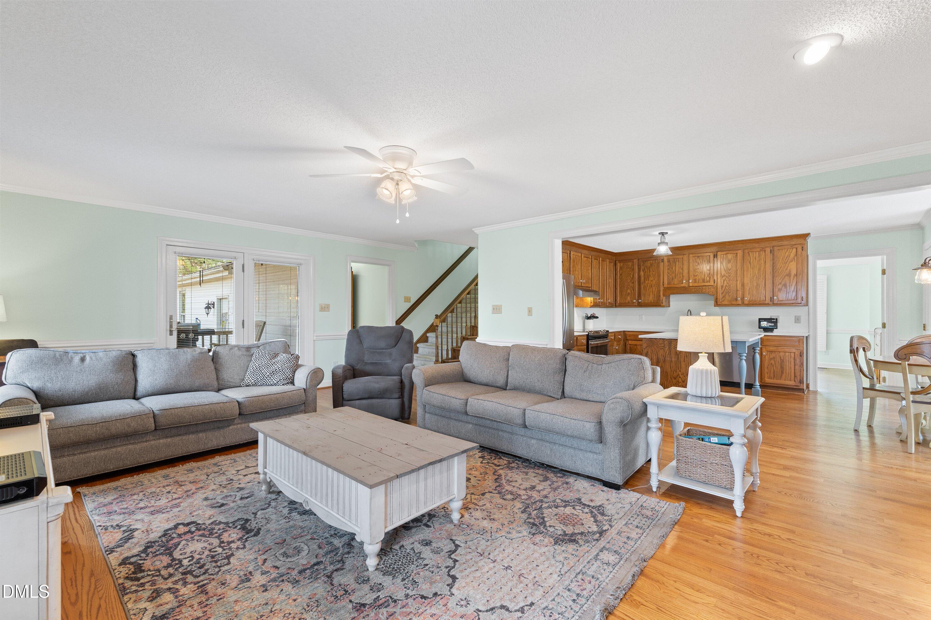 2500 Cravenridge Road Garner, NC 27529 - Photo 19 of 52 a living room with furniture and a wooden floor