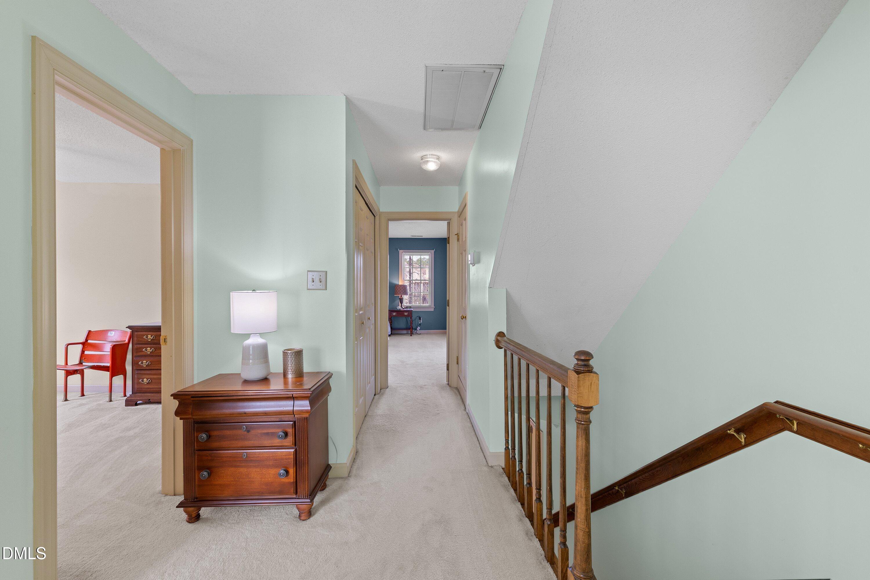 2500 Cravenridge Road Garner, NC 27529 - Photo 29 of 52 a view of a livingroom with furniture and staircase
