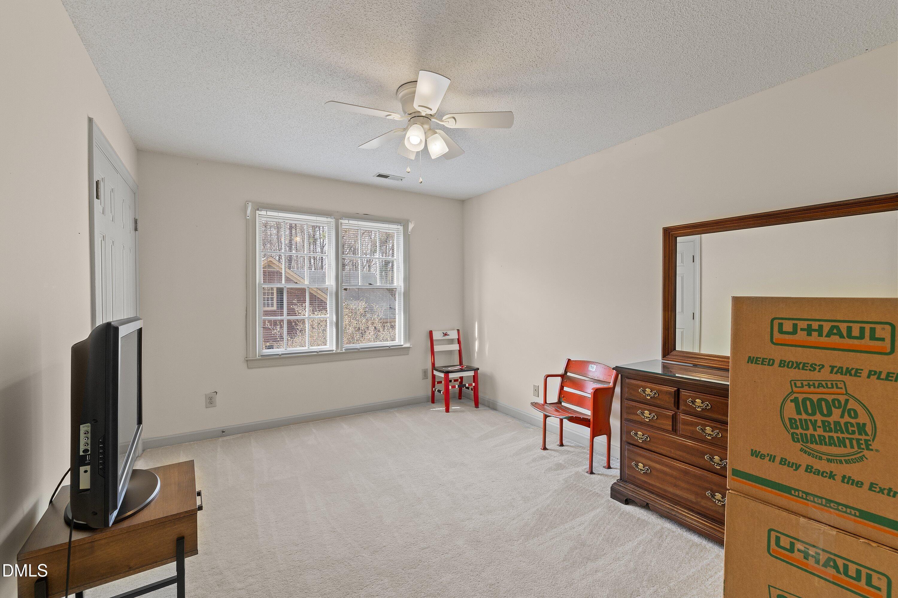 2500 Cravenridge Road Garner, NC 27529 - Photo 32 of 52 a view of a livingroom with furniture and a window