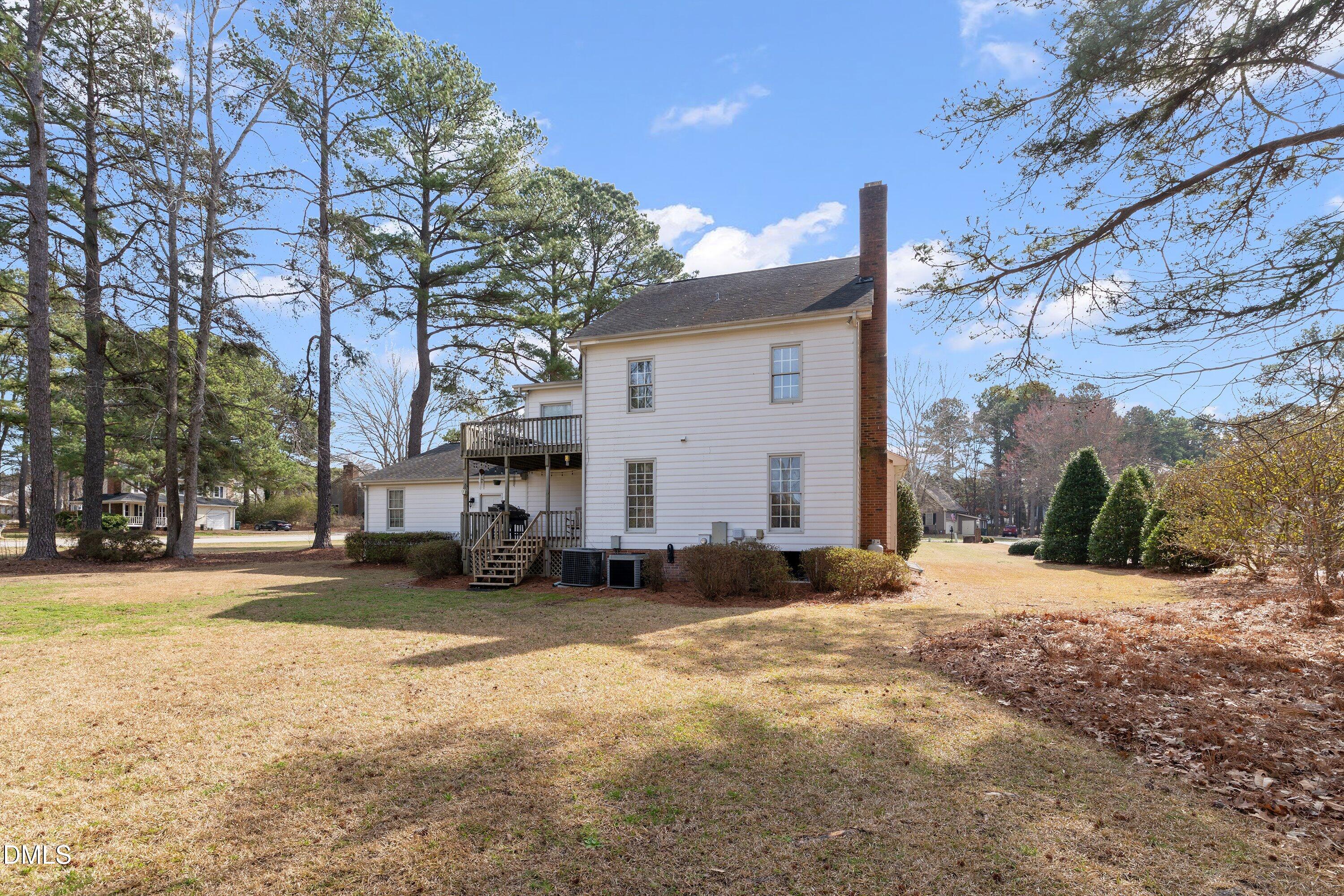2500 Cravenridge Road Garner, NC 27529 - Photo 48 of 52 a view of a house with a snow in the yard