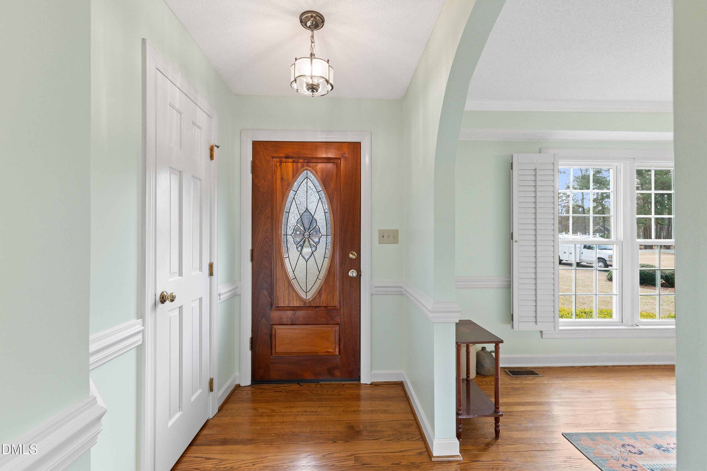 2500 Cravenridge Road Garner, NC 27529 - Photo 6 of 52 a view of room with window and hardwood