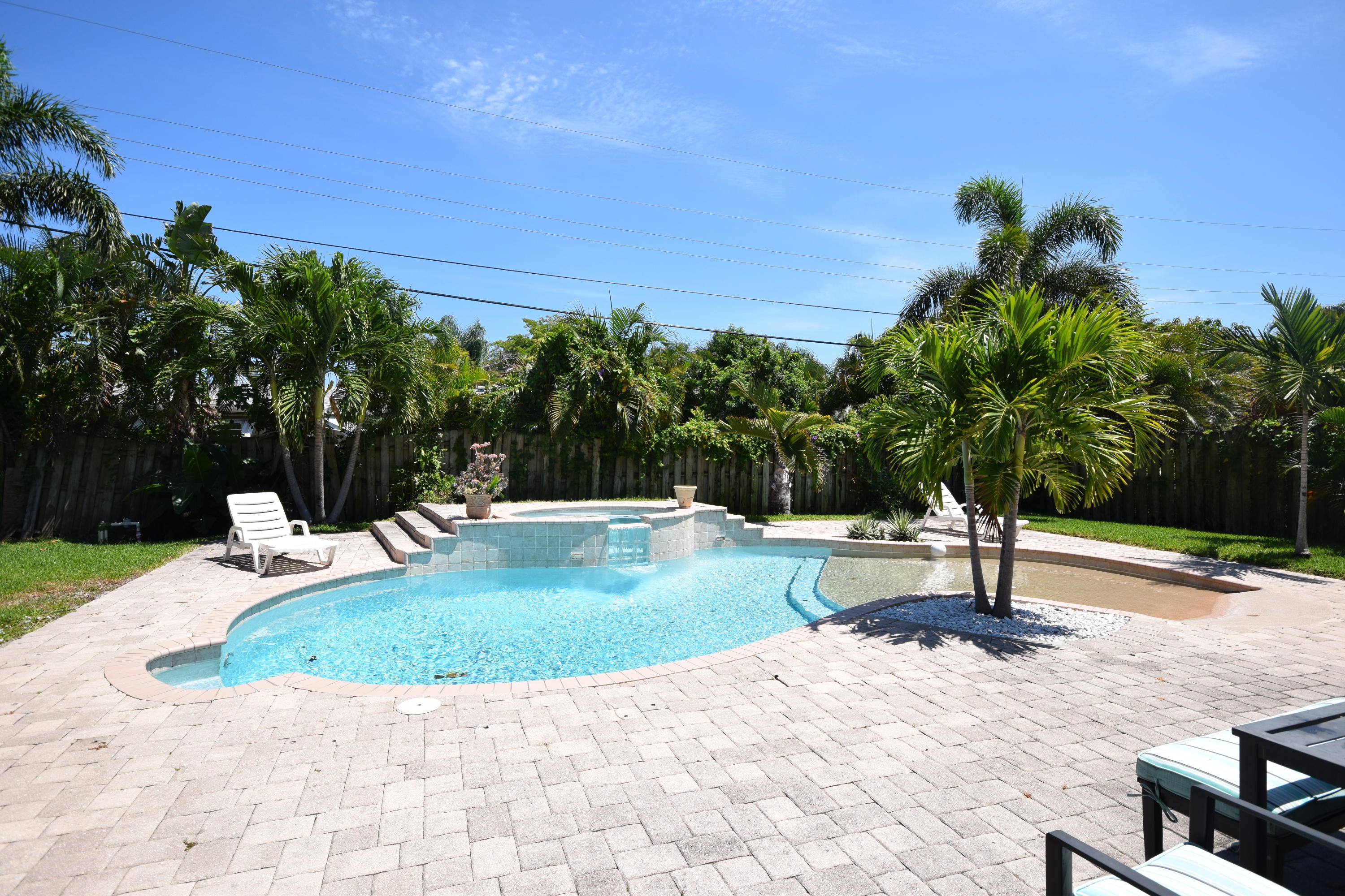 4710 Northwest 3rd Avenue Boca Raton, FL 33431 - Photo 16 of 17 a view of a swimming pool with a patio