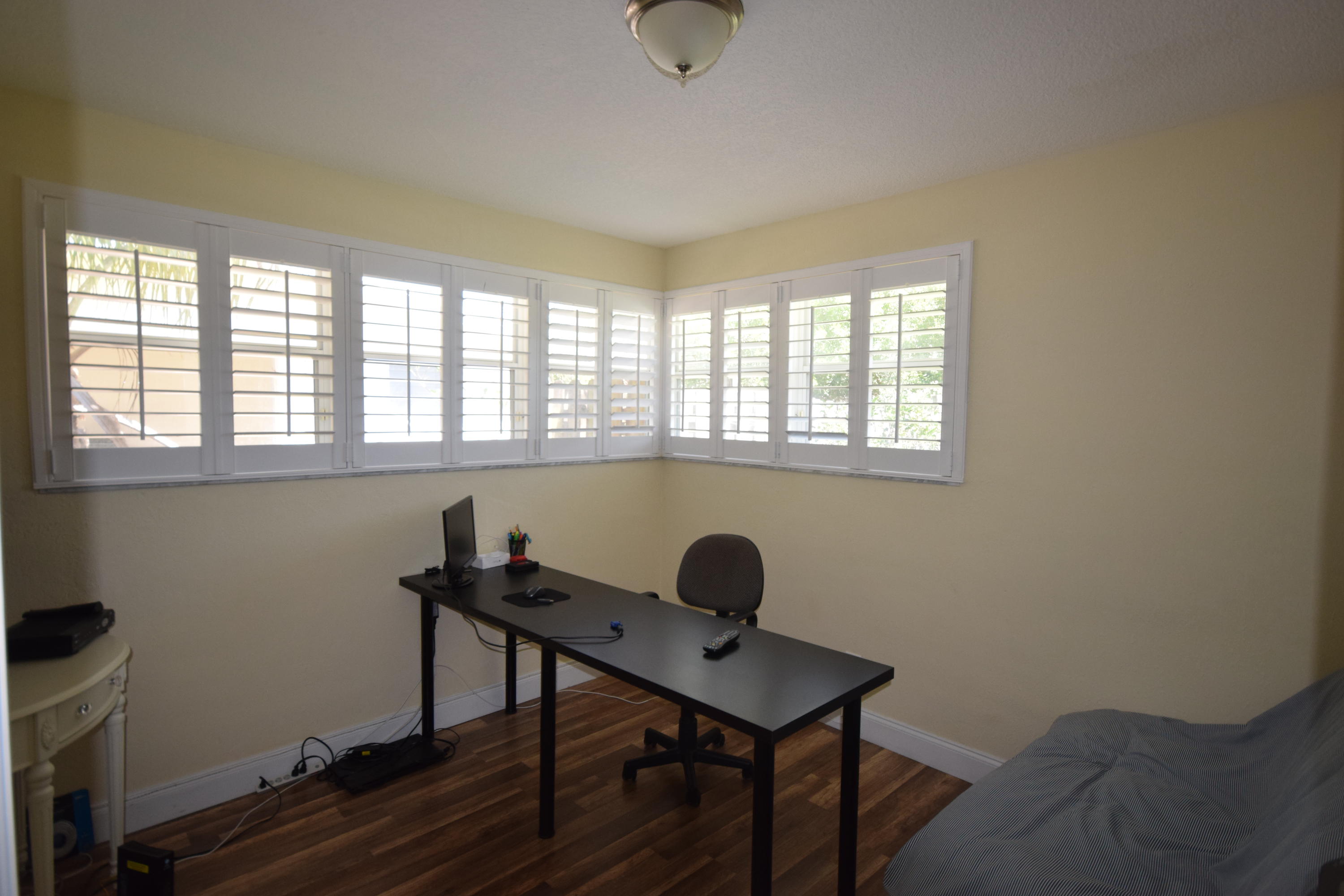 4710 Northwest 3rd Avenue Boca Raton, FL 33431 - Photo 7 of 17 a workspace with furniture and a window